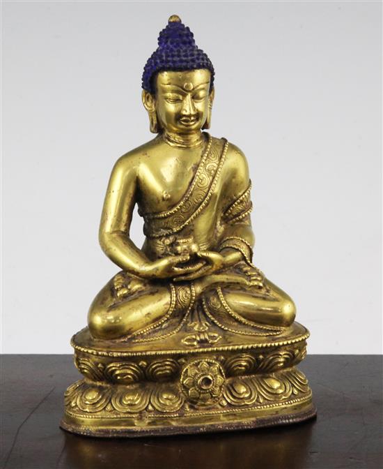 A Sino-Tibetan gilt bronze figure of Sakyamuni Buddha, 15.5cm